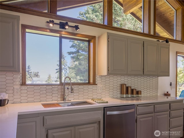 52 W Pheasant Ln, Sequim, WA 98382 - kitchen featuring dishwasher, a sink, light countertops, and lofted ceiling