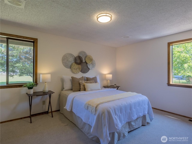 52 W Pheasant Ln, Sequim, WA 98382 - carpeted bedroom featuring baseboards and a textured ceiling