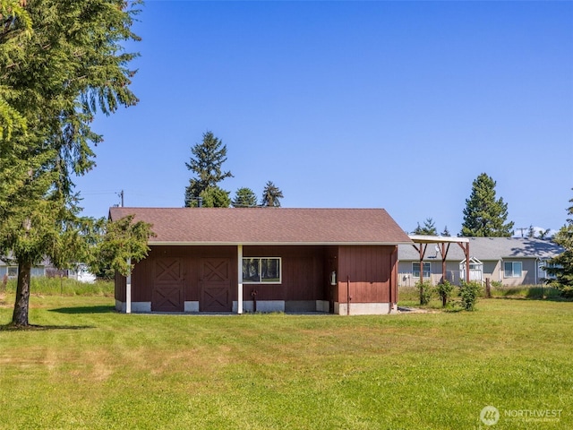 52 W Pheasant Ln, Sequim, WA 98382 - back of property with a lawn and an outdoor structure