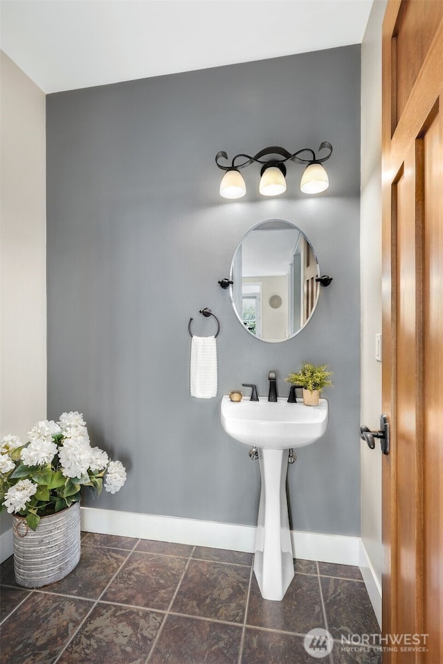884 Saratoga Way, Camano Island, WA 98282 - bathroom featuring baseboards and a sink