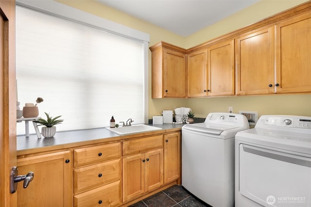 884 Saratoga Way, Camano Island, WA 98282 - washroom with cabinet space, separate washer and dryer, and dark stone finish flooring