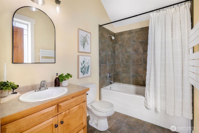884 Saratoga Way, Camano Island, WA 98282 - bathroom featuring toilet, shower / bath combo with shower curtain, vanity, tile patterned floors, and vaulted ceiling
