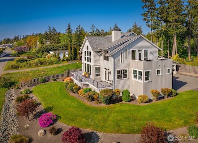 884 Saratoga Way, Camano Island, WA 98282 - rear view of property with a chimney and a wooden deck