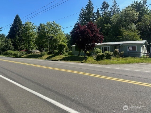 3722 Delphi Rd SW, Olympia, WA 98572 - view of asphalt road with view of wooded area