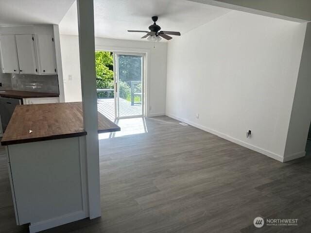 3722 Delphi Rd SW, Olympia, WA 98572 - unfurnished living room featuring a ceiling fan, baseboards, and wood finished floors