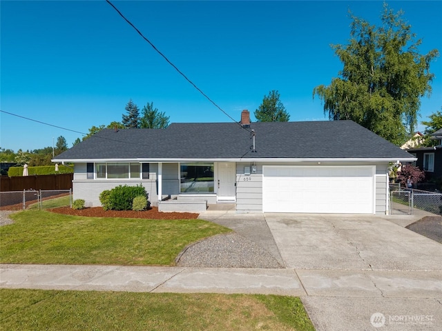 659 NW New York Ave, Chehalis, WA 98532 - ranch-style house featuring driveway, an attached garage, and a chimney