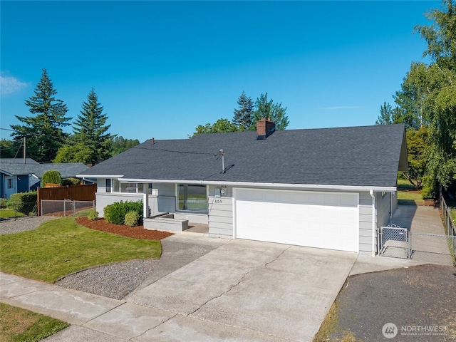 659 NW New York Ave, Chehalis, WA 98532 - view of front of property featuring driveway, an attached garage, a chimney, roof with shingles, and a gate
