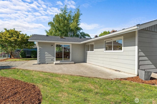 659 NW New York Ave, Chehalis, WA 98532 - rear view of house featuring a patio area and a lawn