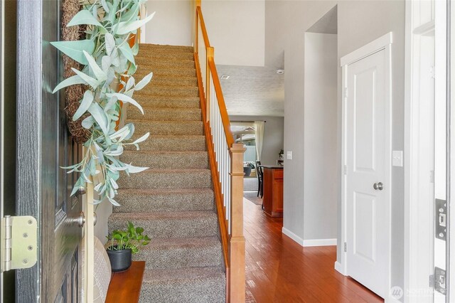 4709 W Fox St, Moses Lake, WA 98837 - stairs with wood finished floors and baseboards