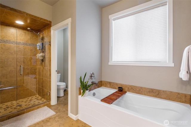 4709 W Fox St, Moses Lake, WA 98837 - full bath featuring a garden tub, a stall shower, toilet, and tile patterned flooring