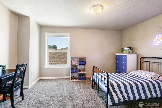 4709 W Fox St, Moses Lake, WA 98837 - bedroom with carpet floors, baseboards, and a textured ceiling