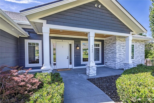 4942 Hurst Landing Rd, Rock Island, WA 98850 - property entrance featuring a porch and stone siding