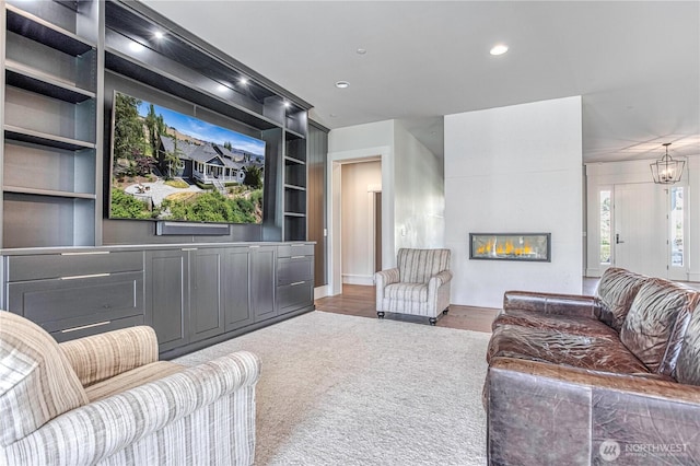 4942 Hurst Landing Rd, Rock Island, WA 98850 - carpeted living area with recessed lighting, built in features, a fireplace, and wood finished floors