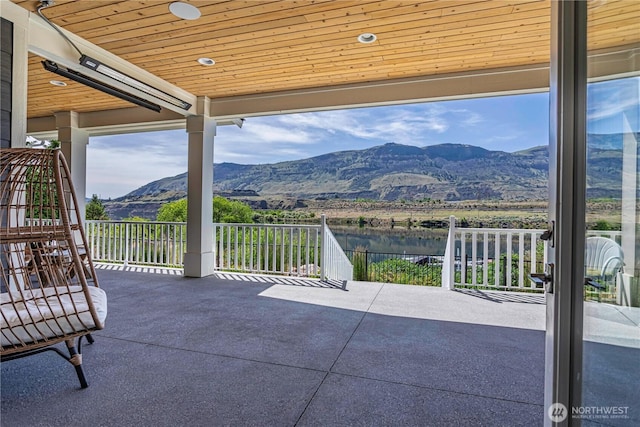 4942 Hurst Landing Rd, Rock Island, WA 98850 - view of patio featuring a water and mountain view