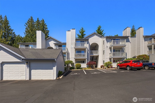 11325 19th Ave SE Unit C309, Everett, WA 98208 - view of property featuring uncovered parking