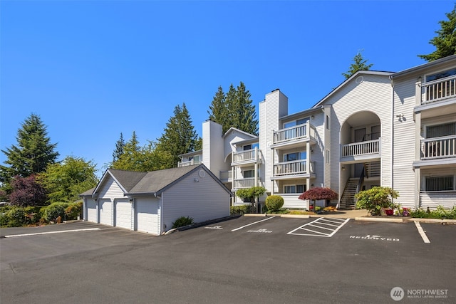 11325 19th Ave SE Unit C309, Everett, WA 98208 - view of property featuring uncovered parking