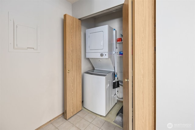 11325 19th Ave SE Unit C309, Everett, WA 98208 - laundry room with estacked washer and dryer, electric panel, and light tile patterned flooring