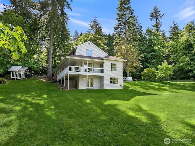 8021 NE Sandpiper Ln, Bainbridge Island, WA 98110 - rear view of house with a yard, french doors, and a deck
