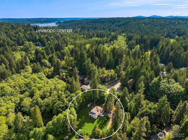 8021 NE Sandpiper Ln, Bainbridge Island, WA 98110 - drone / aerial view of a heavily wooded area