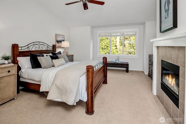 412 15th Ave, Kirkland, WA 98033 - bedroom with a fireplace, light carpet, vaulted ceiling, a ceiling fan, and baseboards