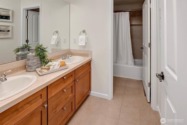 412 15th Ave, Kirkland, WA 98033 - bathroom featuring double vanity, tile patterned flooring, shower / bath combination with curtain, and baseboards
