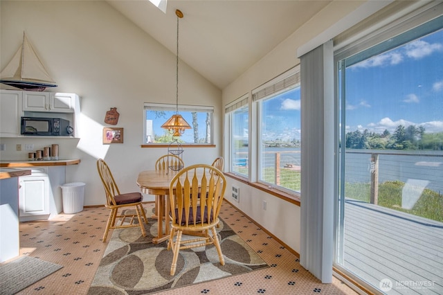 580 Mt Olympus Ave SE, Ocean Shores, WA 98569 - dining room with high vaulted ceiling