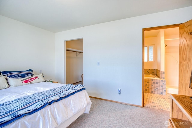 580 Mt Olympus Ave SE, Ocean Shores, WA 98569 - bedroom featuring carpet, baseboards, ensuite bath, and a closet