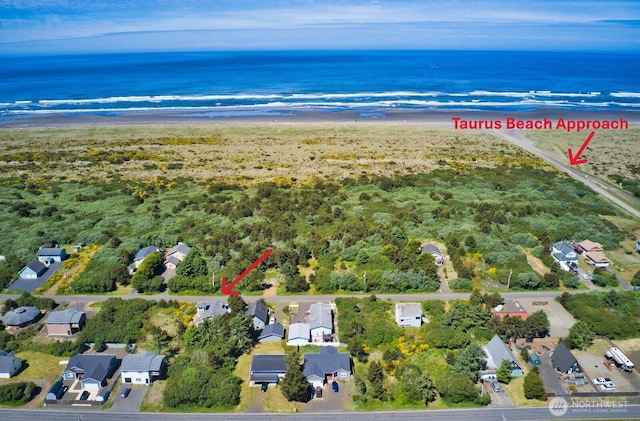 530 Sand Dune Ave SW, Ocean Shores, WA 98569 - aerial view of property and surrounding area featuring a large body of water and nearby suburban area