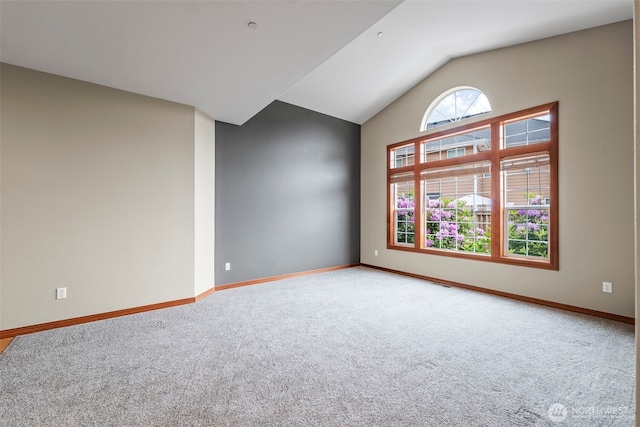 2616 171st Ave E, Lake Tapps, WA 98391 - unfurnished room with carpet flooring, lofted ceiling, and baseboards