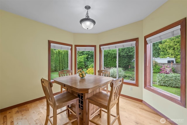 2616 171st Ave E, Lake Tapps, WA 98391 - dining room with light wood finished floors and baseboards
