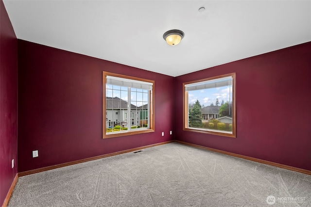 2616 171st Ave E, Lake Tapps, WA 98391 - spare room with carpet and baseboards
