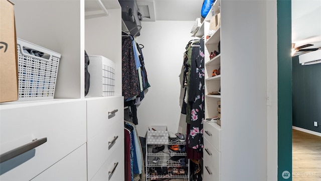 1109 University St, Walla Walla, WA 99362 - walk in closet with wood finished floors and a wall mounted AC