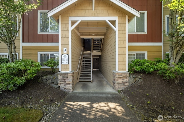 710 240th Way SE Unit J302, Sammamish, WA 98074 - property entrance with board and batten siding