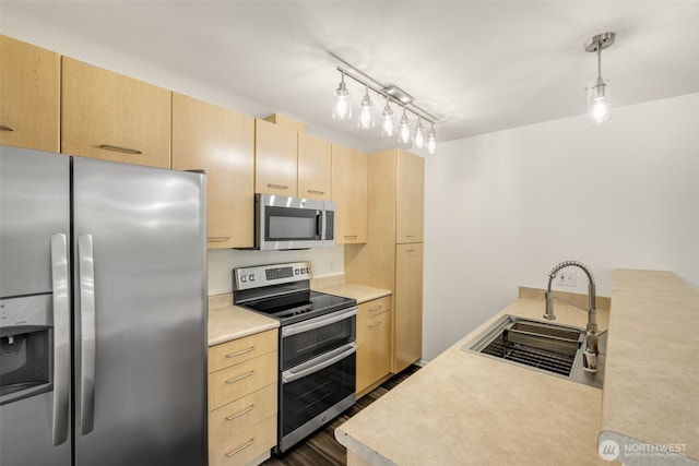 710 240th Way SE Unit J302, Sammamish, WA 98074 - kitchen featuring stainless steel appliances, light brown cabinetry, a sink, and light countertops