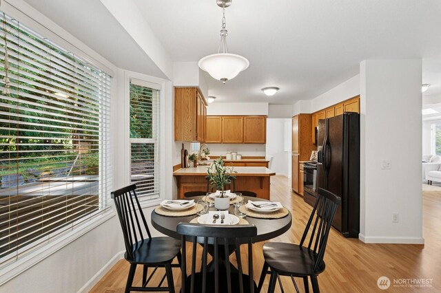 1826 168th Pl SE, Mill Creek, WA 98012 - dining room featuring light wood-style floors and baseboards
