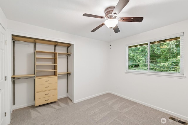 1826 168th Pl SE, Mill Creek, WA 98012 - unfurnished bedroom with a closet, light carpet, baseboards, and ceiling fan