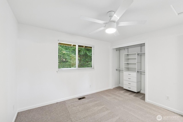 1826 168th Pl SE, Mill Creek, WA 98012 - unfurnished bedroom featuring carpet, baseboards, a closet, and a ceiling fan