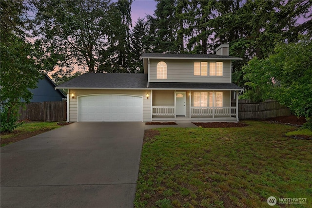 18802 10th Avenue Ct E, Tacoma, WA 98387 - traditional-style house featuring concrete driveway, a garage, a porch, and a chimney