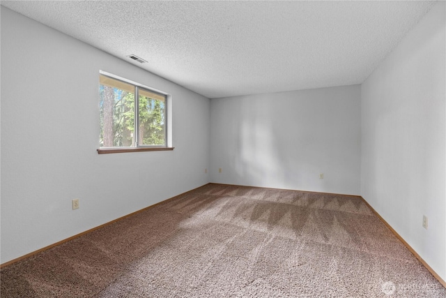 18802 10th Avenue Ct E, Tacoma, WA 98387 - unfurnished room with carpet flooring and a textured ceiling