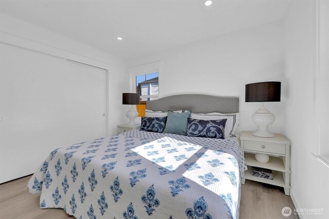 8042 19th Ave NW, Seattle, WA 98117 - bedroom with wood finished floors and recessed lighting