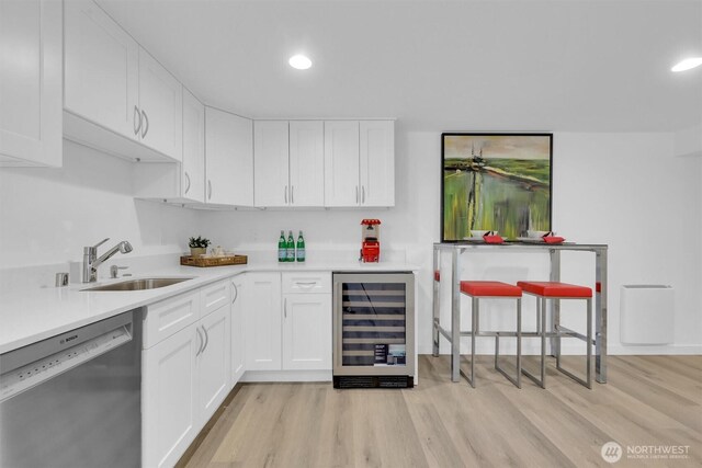 8042 19th Ave NW, Seattle, WA 98117 - indoor bar with wine cooler, dishwasher, light wood-type flooring, and recessed lighting