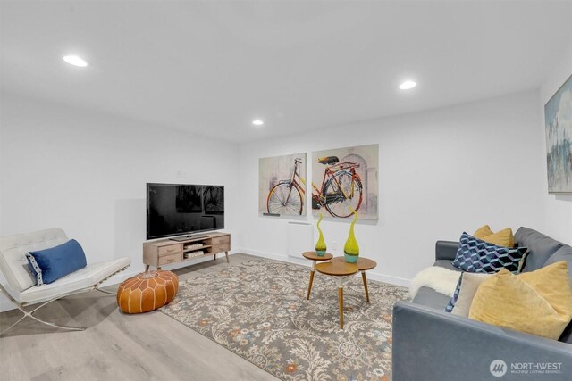 8042 19th Ave NW, Seattle, WA 98117 - living room featuring recessed lighting, baseboards, and wood finished floors