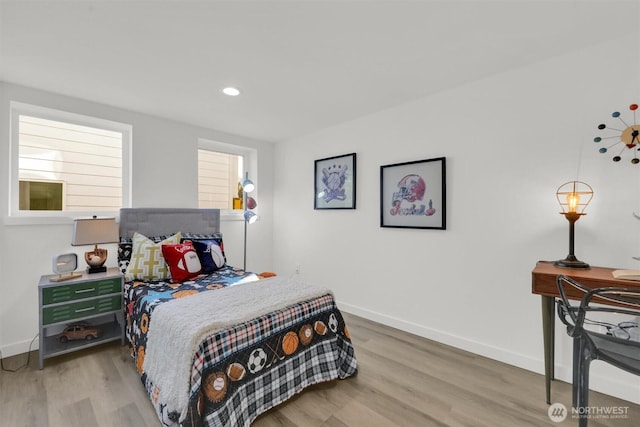 8042 19th Ave NW, Seattle, WA 98117 - bedroom featuring light wood-type flooring, baseboards, and recessed lighting