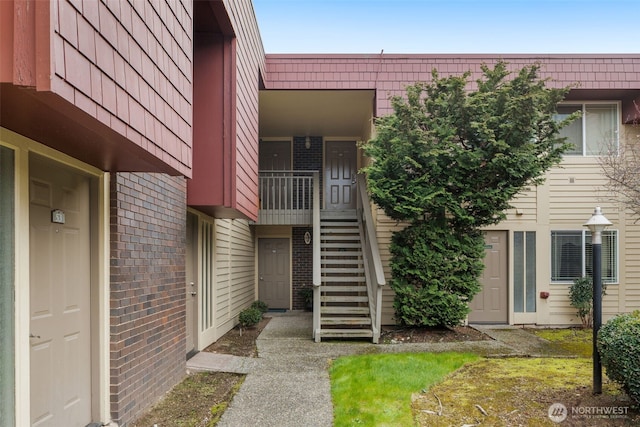 512 141st Ave SE Unit 55, Bellevue, WA 98007 - view of exterior entry featuring brick siding