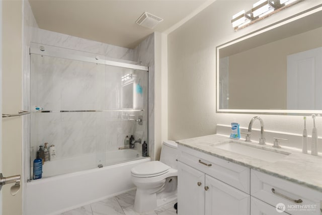 512 141st Ave SE Unit 55, Bellevue, WA 98007 - full bath featuring vanity, toilet, marble look tile flooring, and shower / bath combination with glass door