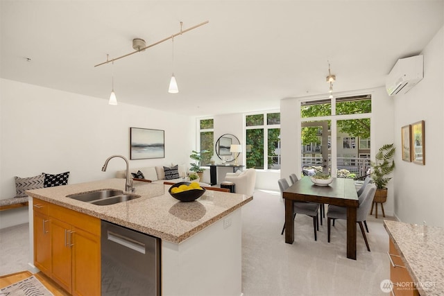 145 Ferncliff Ave NE Unit D338, Bainbridge Island, WA 98110 - kitchen with a sink, dishwasher, a wall mounted air conditioner, and plenty of natural light