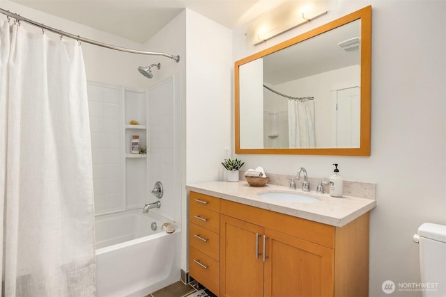 145 Ferncliff Ave NE Unit D338, Bainbridge Island, WA 98110 - bathroom with vanity, shower / tub combo, and toilet