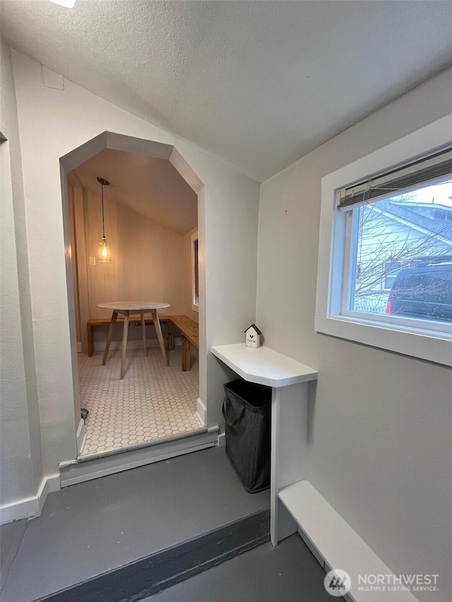 908 Washington Ave N, Long Beach, WA 98631 - bathroom with vaulted ceiling and a textured ceiling