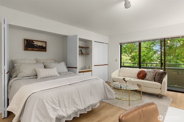 211 Summit Ave E Unit S218, Seattle, WA 98102 - bedroom with light wood finished floors