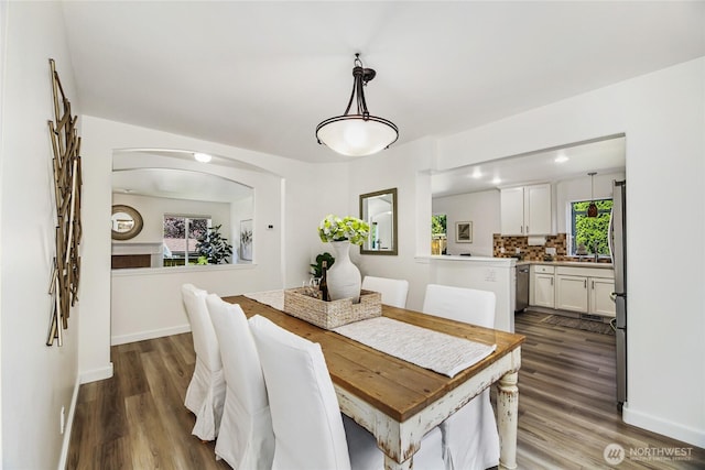 3534 SW Monroe St, Seattle, WA 98126 - dining space featuring wood finished floors and baseboards